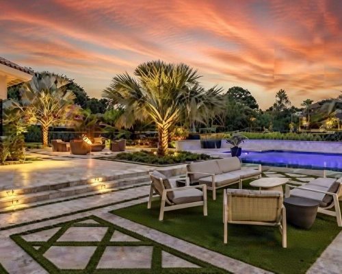 Landscape design Clearwater featuring high-quality professional landscaping services Description: A vibrant outdoor transformation in Clearwater, highlighting expert landscape design with durable plants and elegant features suited for Florida's climate.